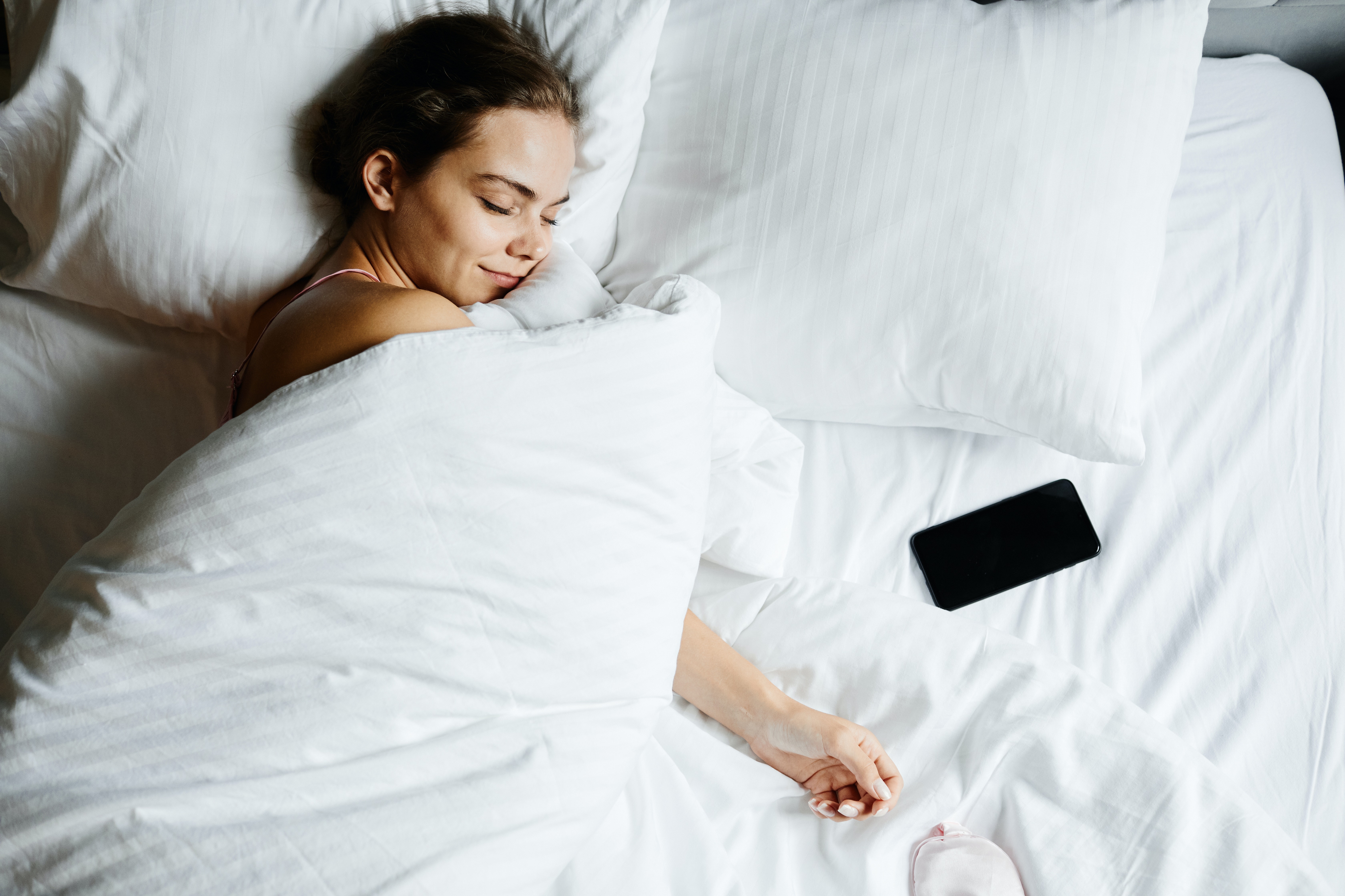 women sleeping in a duvet